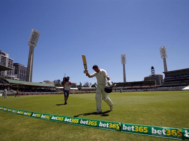 Ross Taylor acknowledges the crowd as he walks off the ground in Perth after being dismissed for...