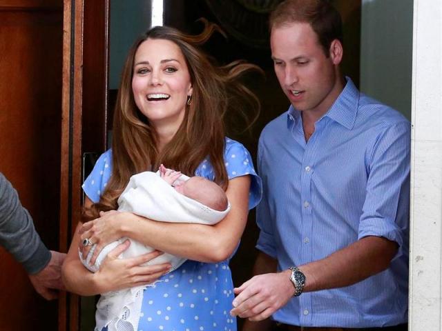 The Duke and Duchess of Cambridge emerge from St Mary's Hospital with their baby boy yesterday....