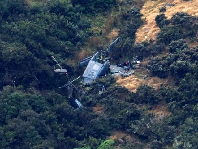 The wreckage of the Air Force Helicopter on the side of a hill in Pukerua Bay in Wellington....