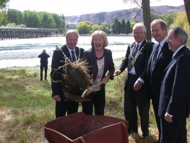 Waitaki MP Jacqui Dean, with the old 133-year-old, single-lane wooden bridge in the background,...