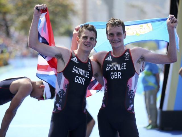 Alistair and Jonny Brownlee celebrate their triumph at the Rio Olympics. Photo: Reuters