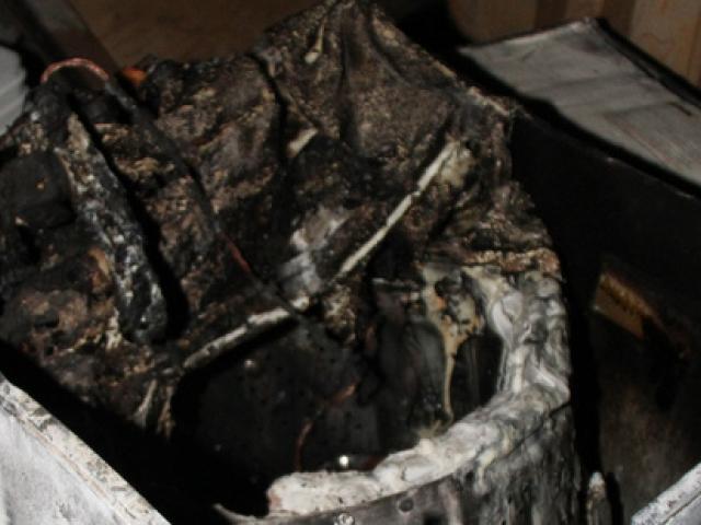 The remains of a Samsung washing machine, which caught fire and caused significant damage to a...