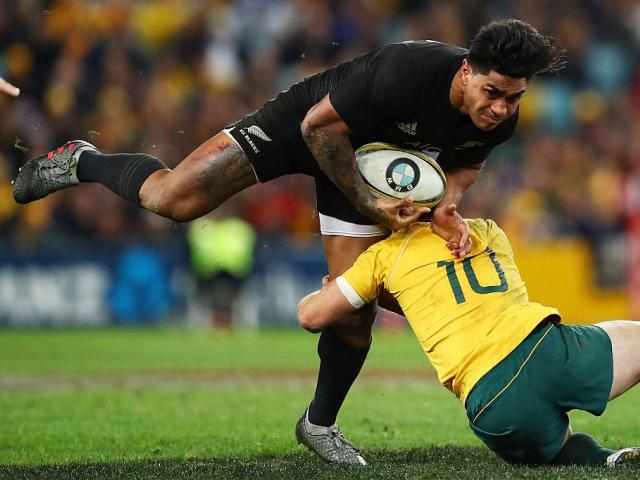 Malakai Fekitoa attempts to run over Bernard Foley during the All Blacks' win. Photo: Getty Images