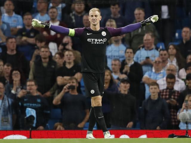 Joe Hart celebrates at the end of Manchester City's recent Champions League qualifying match....