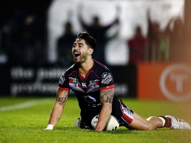 Shaun Johnson scores a try against the Gold Coast Titans at the weekend. Photo: Getty Images