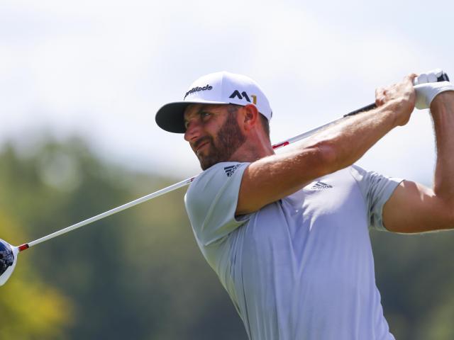 Dustin Johnson plays a shot during the first round at the Tour Championship. Photo: Reuters