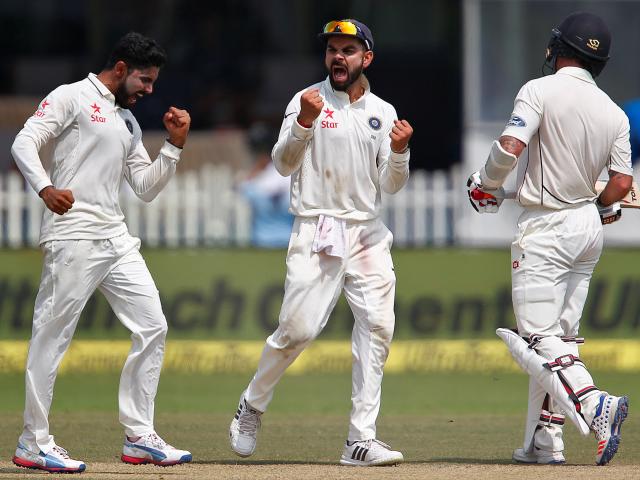 Virat Kohli (middle) celebrates a wicket during the first test. Photo: Reuters