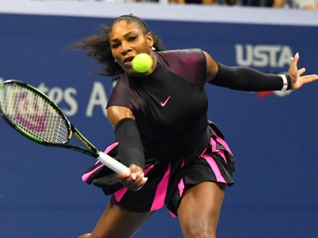 Serena Williams plays a shot during her round one win. Photo: Reuters