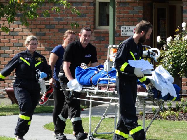 Injured skydiver Sasa Jojic is stretchered to a waiting Otago Regional Rescue Helicopter in...