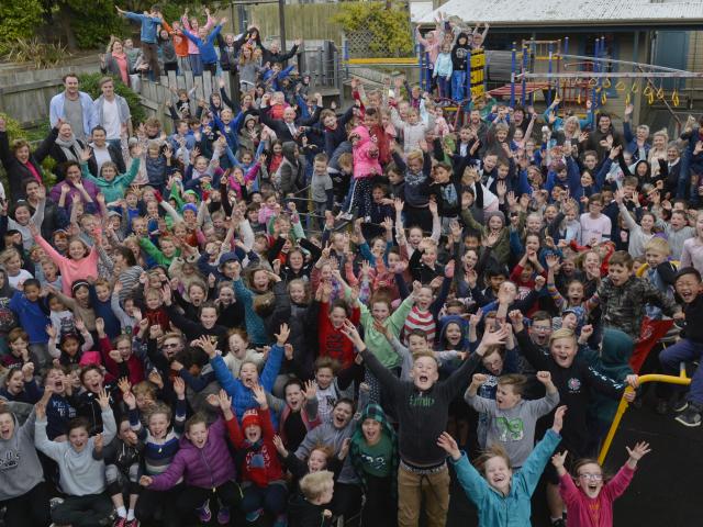 Kaikorai Primary School pupils and staff celebrate news the school will be rebuilt after...