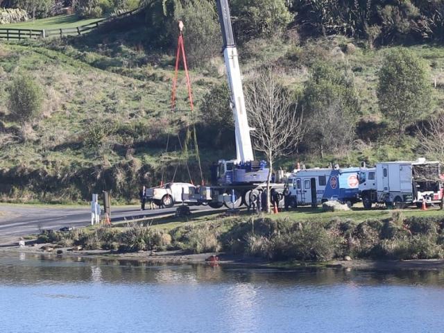 A vehicle is removed from Lake Arapuni during the investigation into the disappearance of Kim...