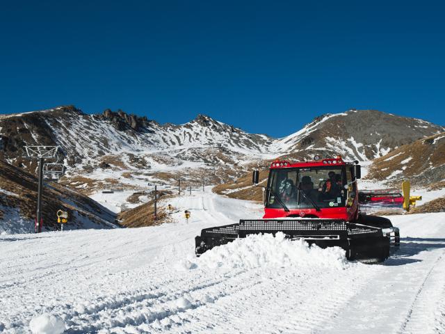 A snow groomer operates on the The Remarkables ski area learners’ slope yesterday. Photo: Kyle...