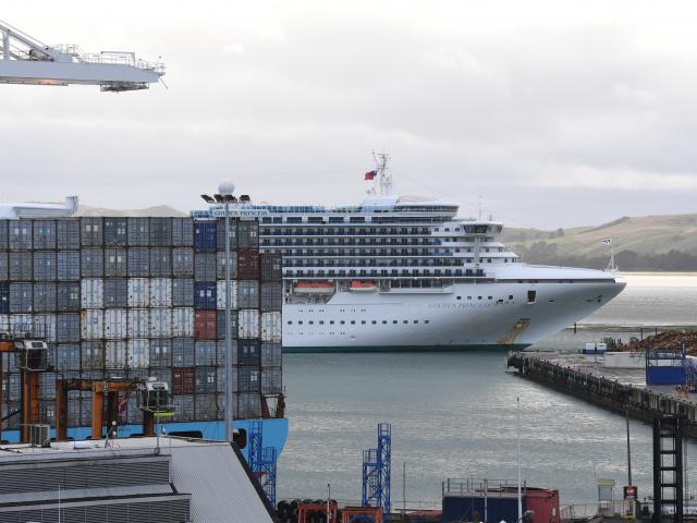 Cruise ship Golden Princess nudges into Port Chalmers, to berth opposite container ship Laust...