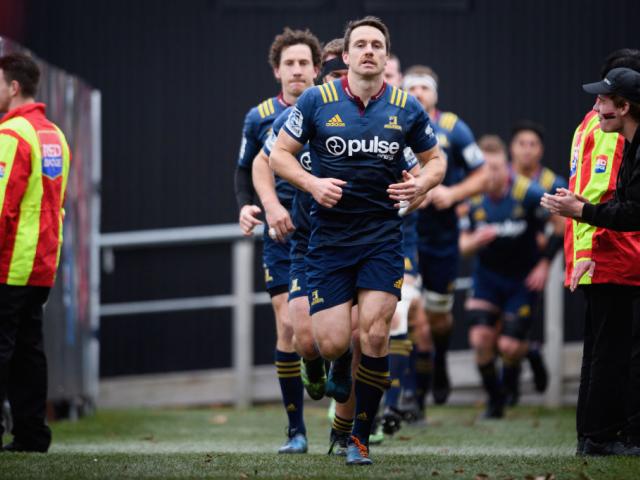 Ben Smith of the Highlanders leads his team onto the field. Photo: Getty