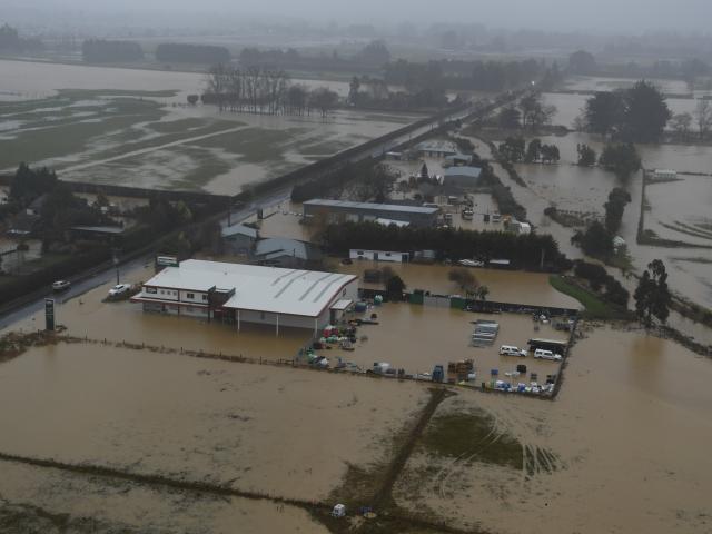 The recently built Farmlands building in Dukes Rd during the flood. Photo: Stephen Jaquiery.