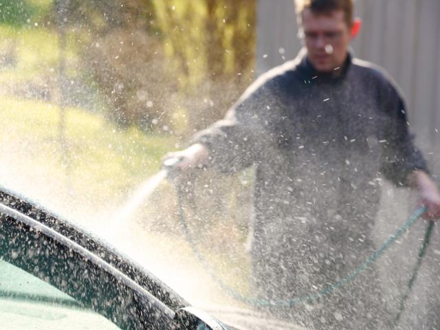 The ban in Gore applies to washing cars with a hose. Photo Getty