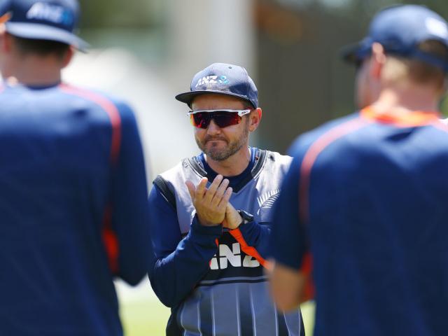 Black Caps coach Mike Hesson holds a team talk during game one of the Twenty20 series between New...