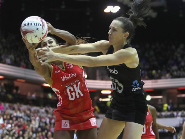 England's Geva Mentor (L) wins the ball from New Zealand's Bailey Mes. Photo Getty
