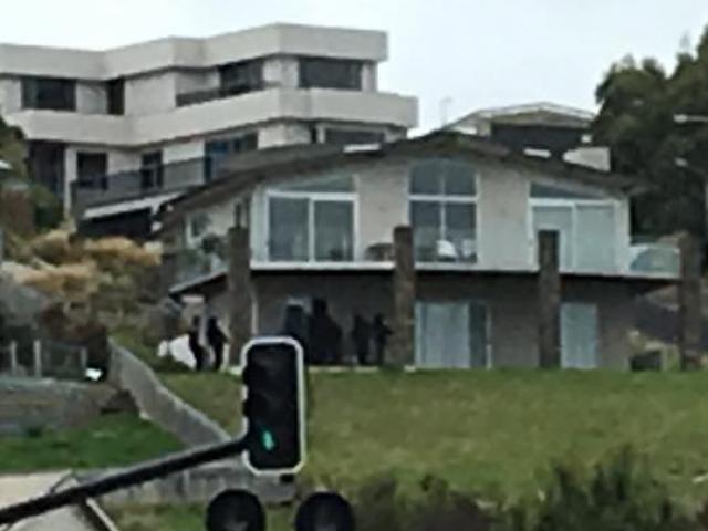 The armed offenders squad at a property in Mosgiel today. Photo: Facebook/Tony Mason