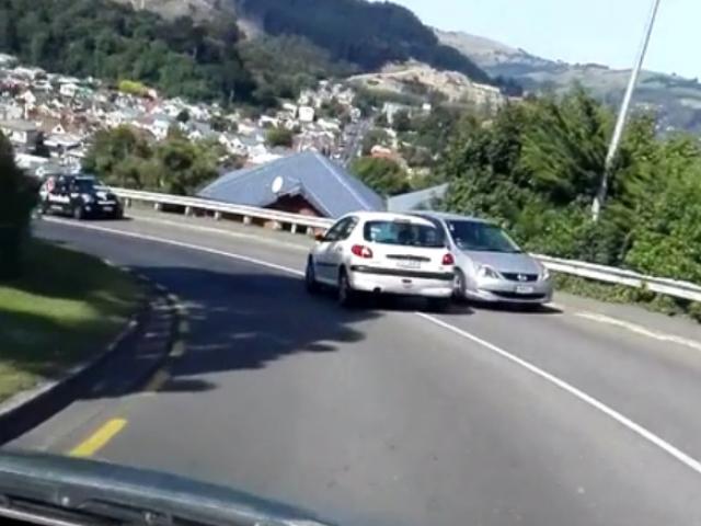 A still from a video shot by Dunedin man Richard Mountain which shows another motorist repeatedly...