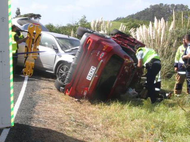 Emergency services at the crash scene. Photo: NZ Herald