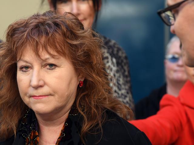Clare Curran is supported by fellow Dunedin MP David Clark (right) at a media conference in...