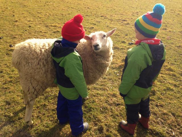 Two Gems children meet a local. Photo: Supplied