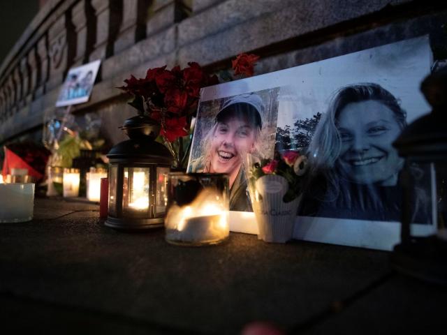 Flowers and candles in memory of Louisa Vesterager Jespersen and Maren Ueland are seen at the...