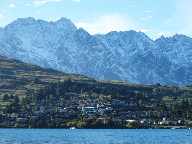 Remarkables soar above the Queenstown suburb of Kelvin Heights and Lake Wakatipu’s Frankton Arm....