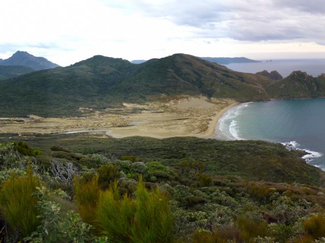 East Ruggedy Beach, Rugged Islands and, in the distance, the Ruggedy Range on the West Coast of...