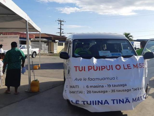 Health workers' van with public notice about measles countermeasures in Samoa earlier this month....