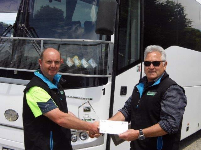 East Coast Passenger Services managing director Mike Chittock (right) presents Barry Coombes with...