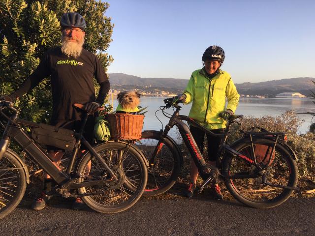 Mike, Dexter and Tania from electify.nz Dunedin enjoy their 40km daily commute...Photo supplied