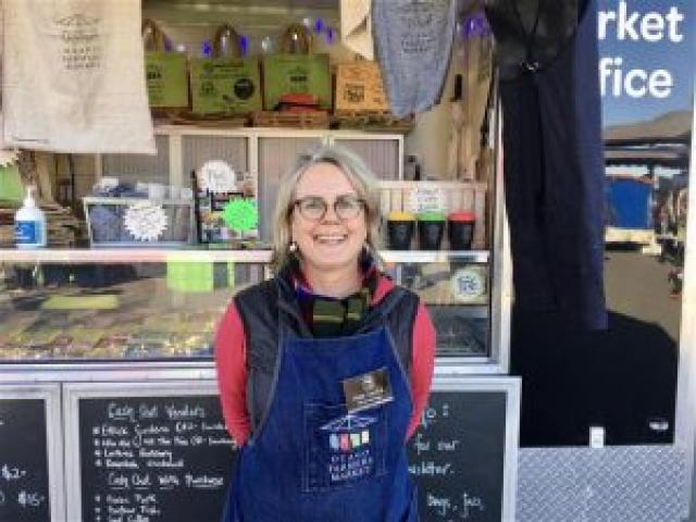 Otago Farmers Market manager Kate Vercoe enjoys Saturday’s sunny day and busy market. PHOTO:...