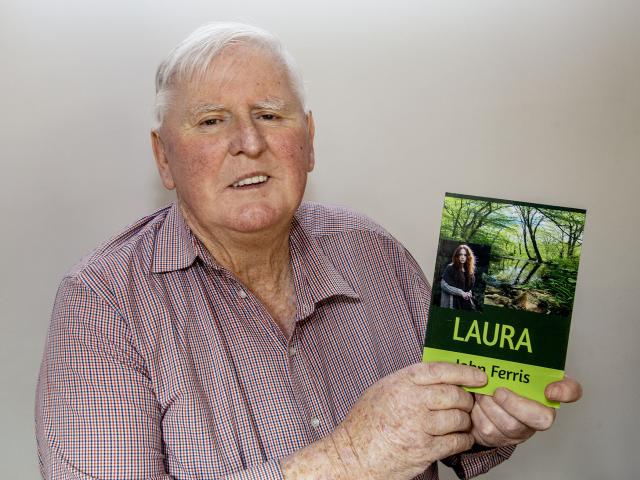 John Ferris with his book. Photo: Geoff Sloan