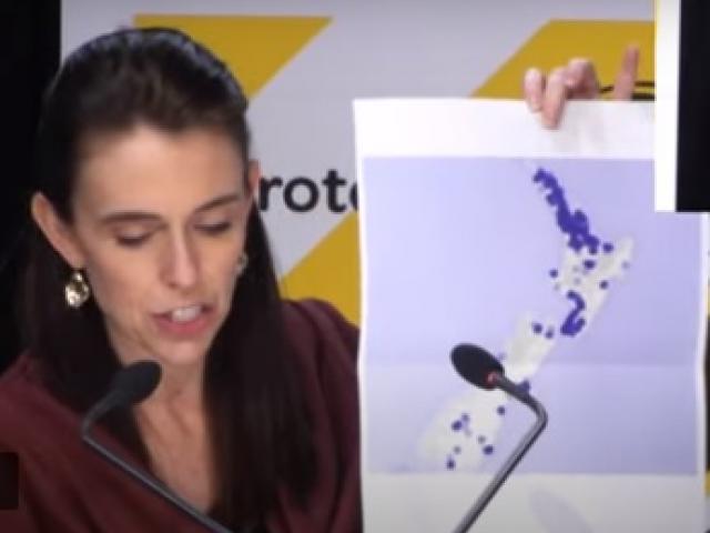 Prime Minister Jacinda Ardern displays a heat map showing the whereabouts of Covid contacts while...