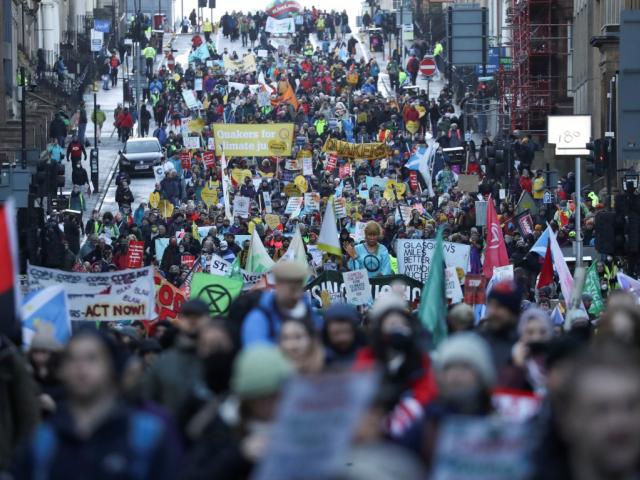 People take part in a protest against the UN Climate Change Conference in Glasgow. Photo: Reuters