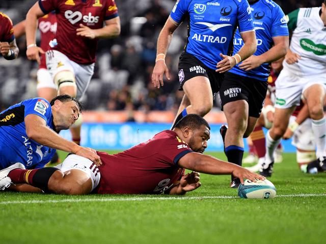 Highlander Andrew Makalio scores a try against the Western Force at Forsyth Barr Stadium. Photo:...
