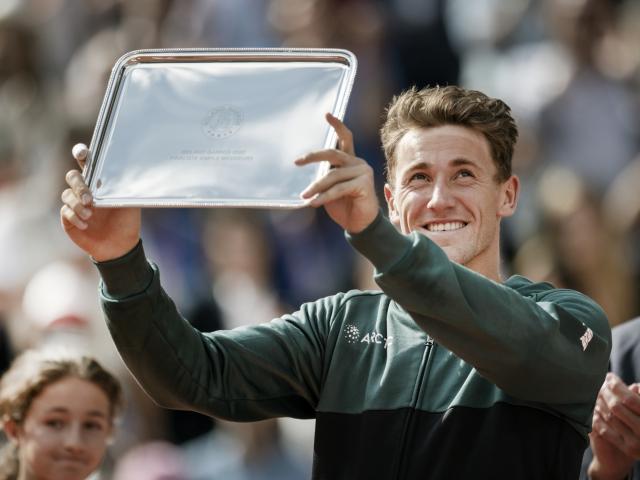 Casper Rudd of Norway with his runners up trophy. Photo: Getty Images  