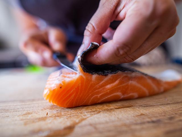Remove the skin from the salmon fillets. PHOTO: GETTY IMAGES