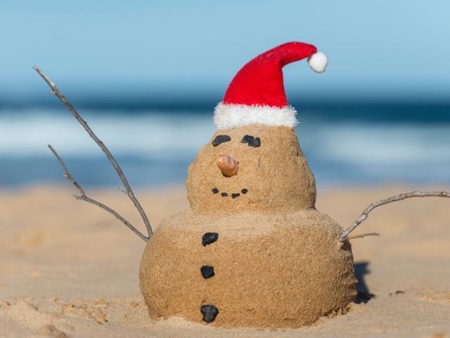 Some Kiwis may get to have Christmas at the beach this year. Photo: Getty