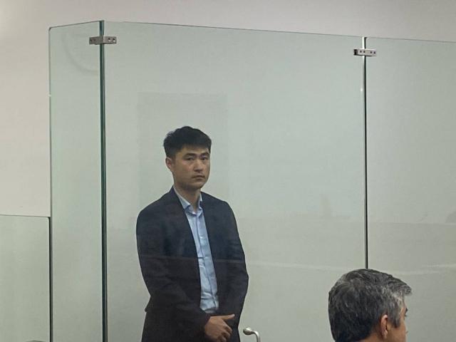 Bo Wang in court for sentencing. Photo: George Block