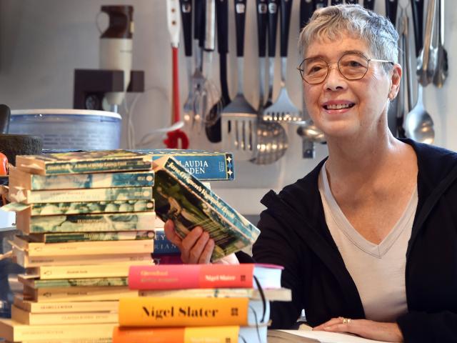 Charmian Smith with some of her cookbooks. PHOTO: PETER MCINTOSH