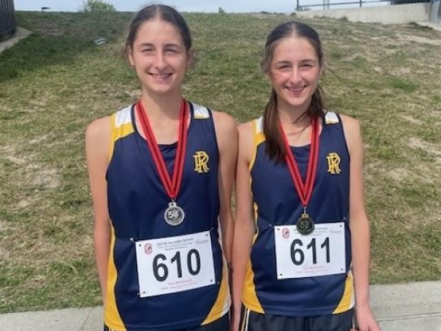 Eliza (left) and Zara McDonnell were first and second in the junior girls high jump at the New...
