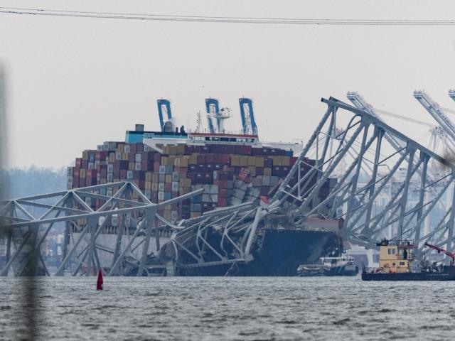 The container ship Dali sits in the water in Baltimore Harbor amid wreckage of the Francis Scott...