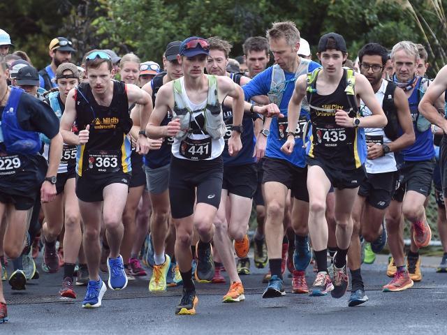 Competitors set off at the start of the Three Peaks race at the Woodhaugh Gardens yesterday...