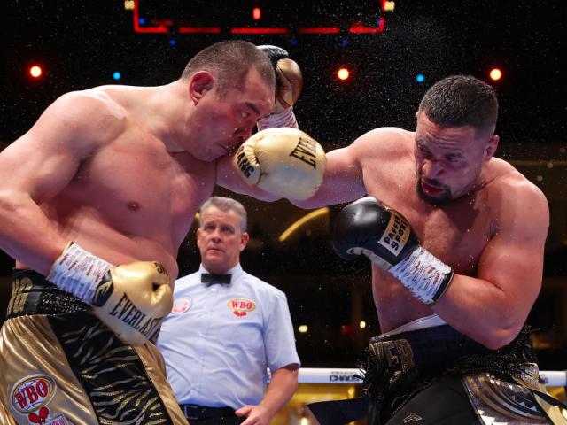Zhilei Zhang and Joseph Parker exchange punches during their WBO Interim World Heavyweight title...