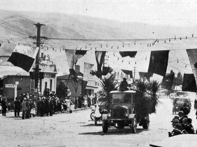 A procession of cars during a gala day in Roxburgh to celebrate the opening of the Teviot power...