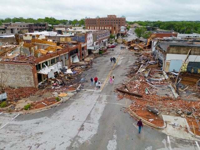 Damaged buildings in Sulphur, Oklahoma after a tornado hit the town the night before. Photo:...