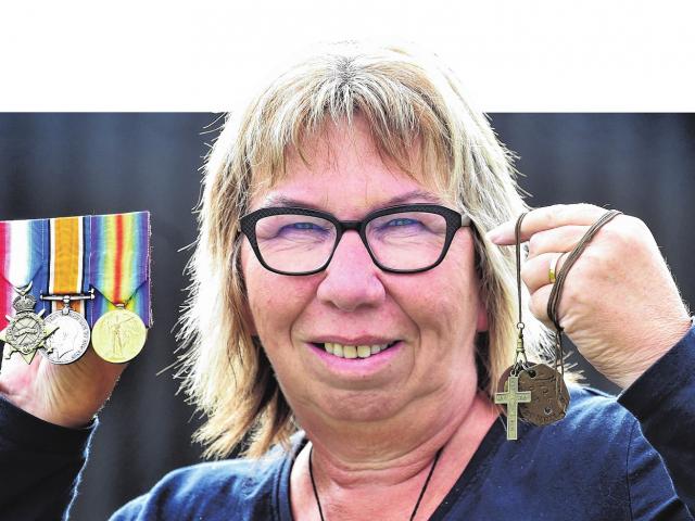 Cindy Kennedy with the medals awarded to her great-uncle. Photo: Peter McIntosh